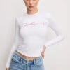 GOOD AMERICAN DOLLY BUTTERFLY SUPER STRETCH LONG SLEEVE | WHITE001 2 GOOD AMERICAN DOLLY BUTTERFLY SUPER STRETCH LONG SLEEVE | WHITE001 -GOOD AMERICAN STORE M 250307 12 GT0683DP W001 4 0064
