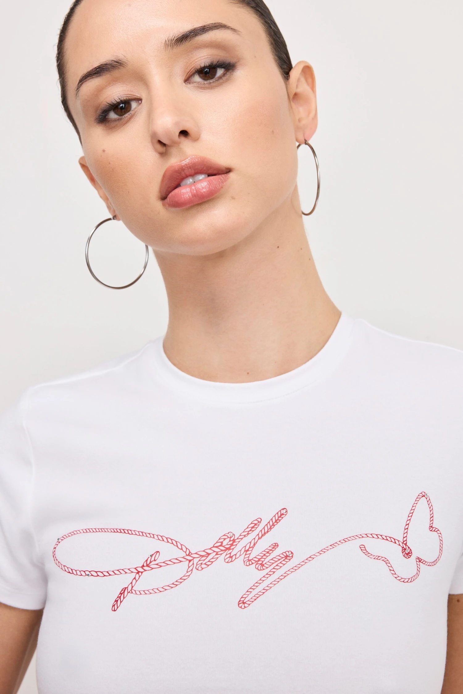 GOOD AMERICAN DOLLY SIGNATURE SUPER STRETCH BABY TEE | WHITE001 3 GOOD AMERICAN DOLLY SIGNATURE SUPER STRETCH BABY TEE | WHITE001